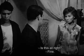 Image from The Battle of Algiers - Saadi Yacef approving women on their looks.