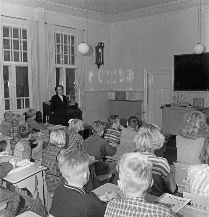 Students listen to the school radio at the Västerby Elementary School in 1951