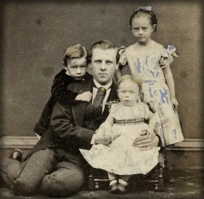 Portrait of a Father with His Three Children. Glasgow, 1867